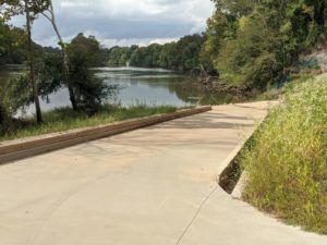 Canoe Ramp with paved drive for the boat landing with lake in background