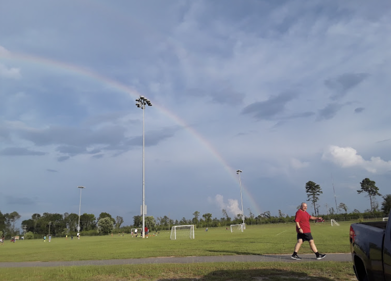 Rainbow over soccer fields