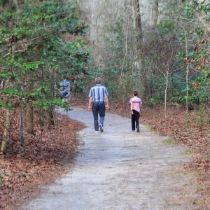 A Father and son walking a wide path at Goodale Sate Park Nature Trail