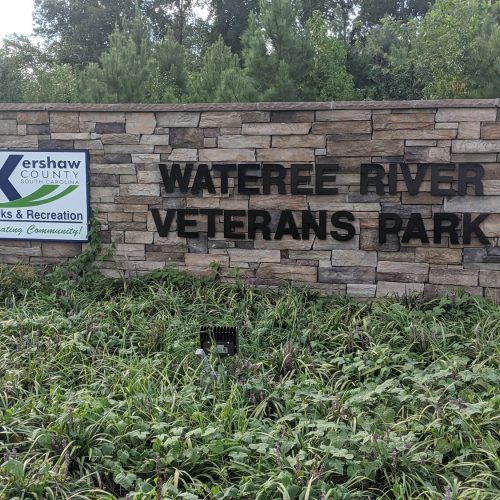 Wateree River Veterans Park signage with Kershaw County Parks and Recreations emblem on it.