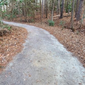 A wide paved trail at Goodale state park curving at the end